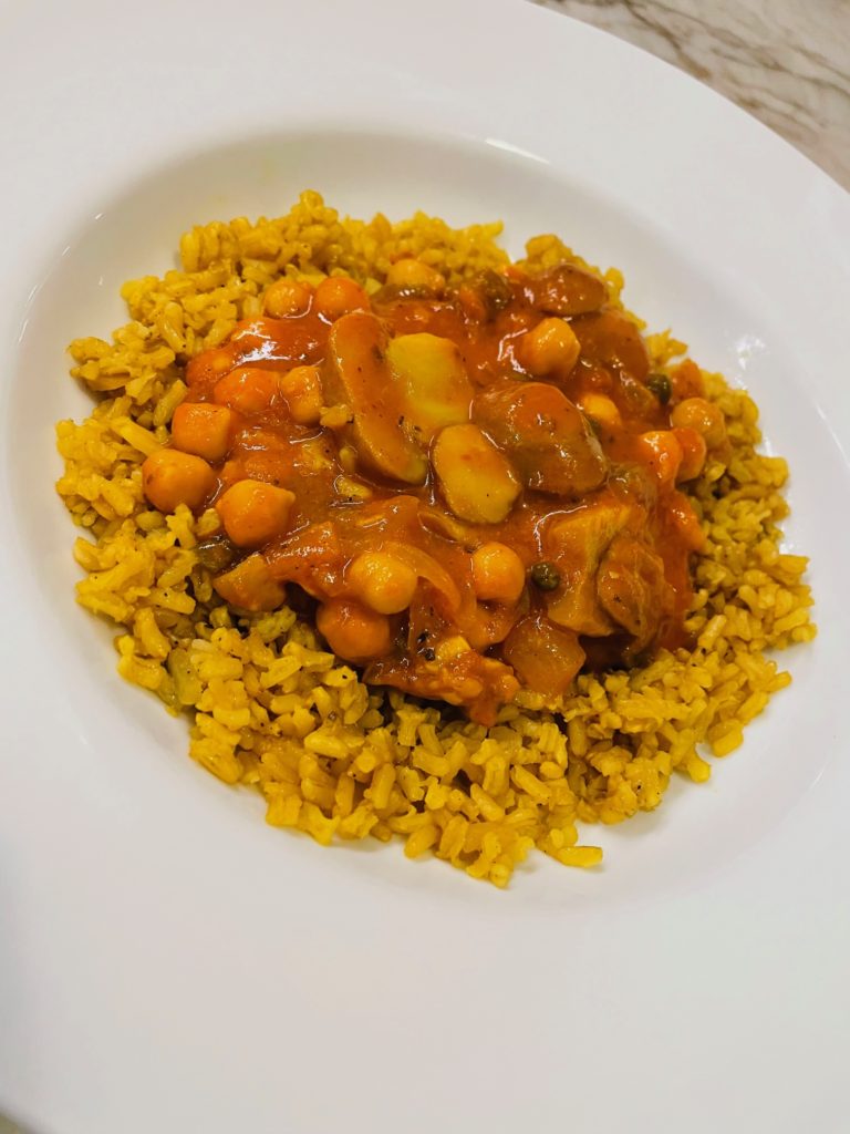 veggie tikka masala with chickpeas, over yellow rice