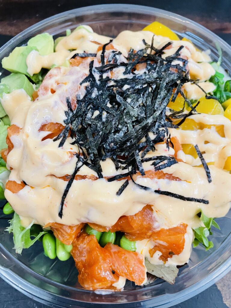 Spicy Salmon Poke bowl with brown rice and all the veggies- a great source of fiber, antioxidants, vitamins, minerals, and protein